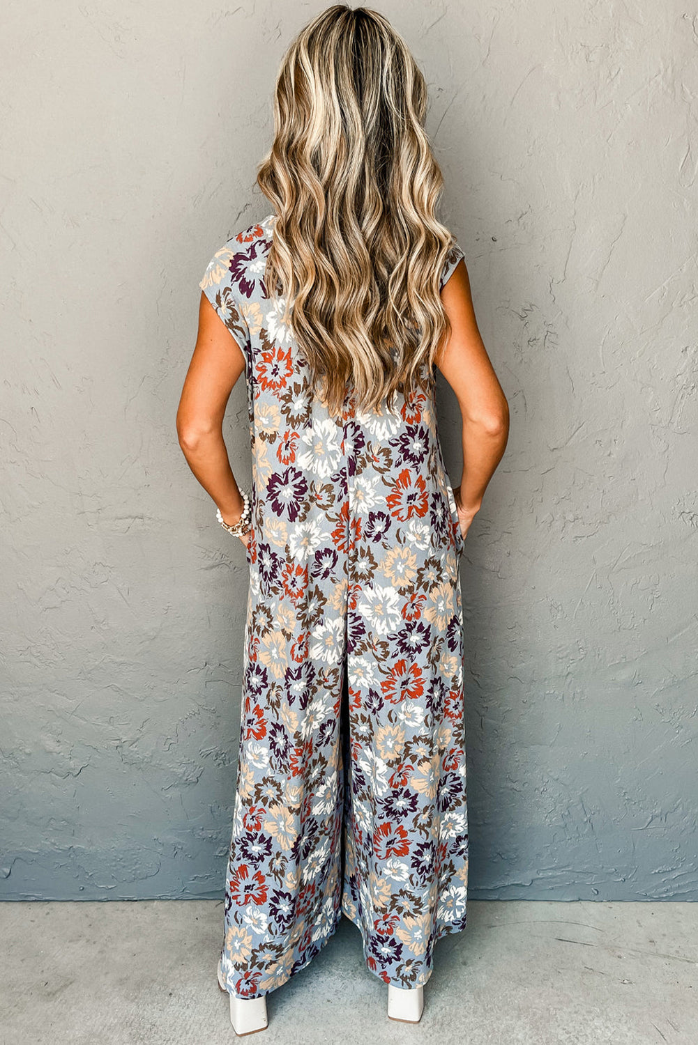 Sky Blue Floral Sleeveless Pocketed Wide Leg Jumpsuit Jumpsuits ed68c3bdb132fce3
