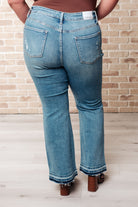 BeautybyShree Isla Mid Rise Distressed Released Hem Bootcut Jeans