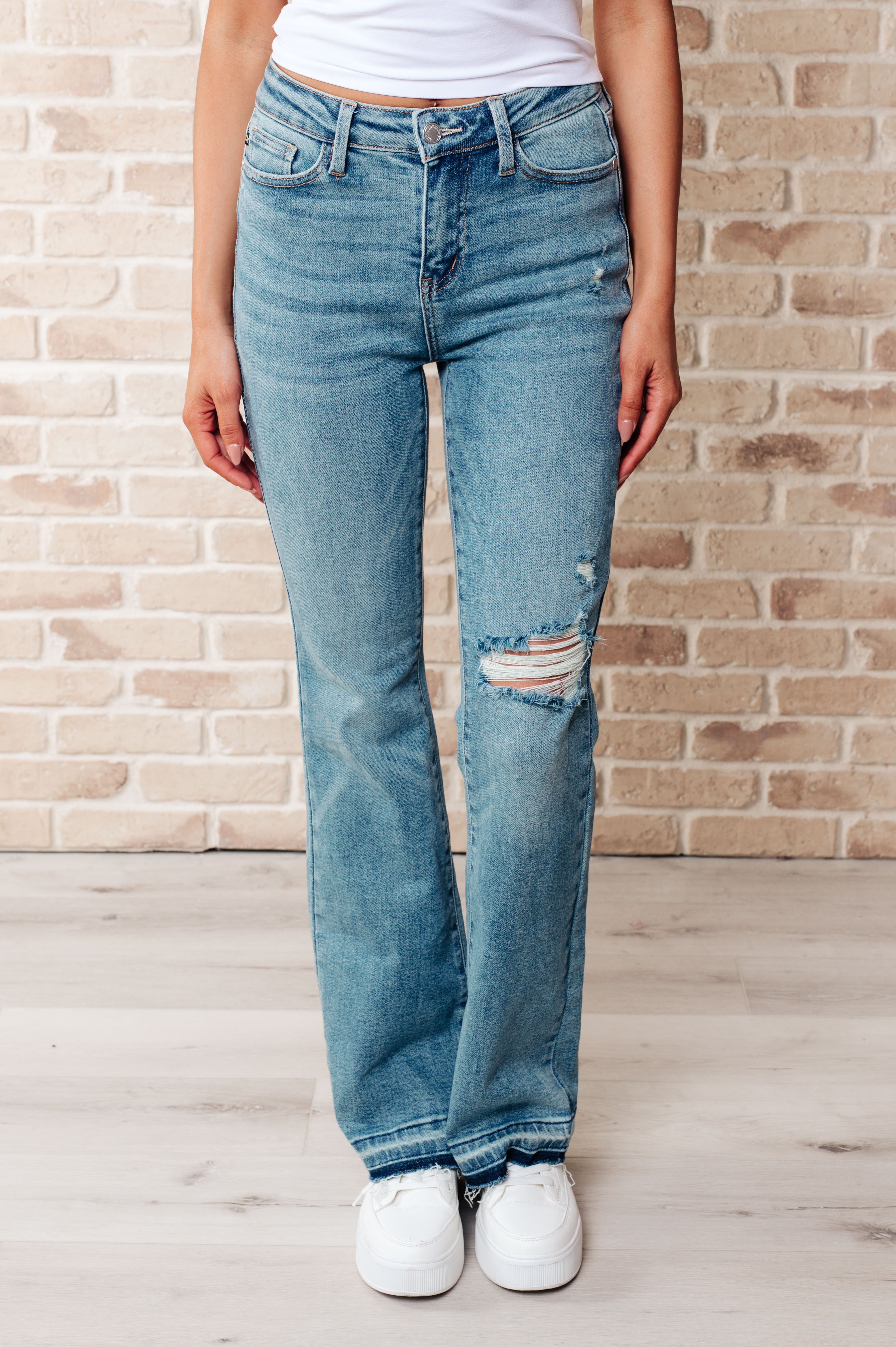 BeautybyShree Isla Mid Rise Distressed Released Hem Bootcut Jeans