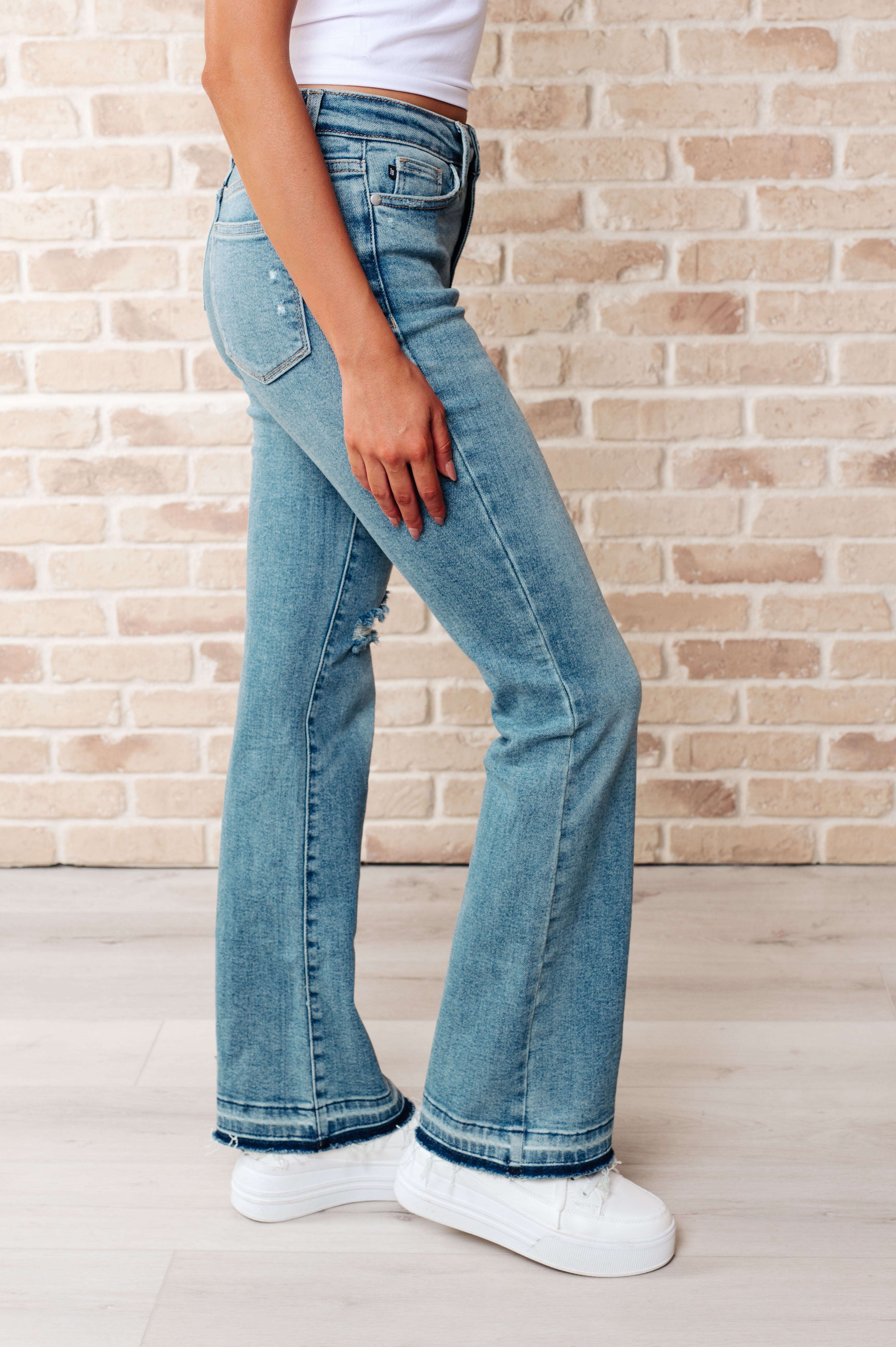 BeautybyShree Isla Mid Rise Distressed Released Hem Bootcut Jeans