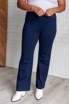 Magic Straight Pants in Navy made with Ponte Knit fabric, featuring elastic waistband, straight leg, faux pockets, and vented hem.