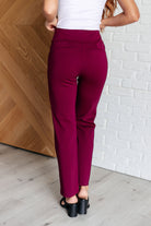 Magic Straight Pants in Wine - back view showing faux welt pockets and straight leg silhouette. Perfect for elevating any outfit.