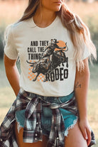 White AND THEY CALL THE THING RODEO Heat Transfer Printing Graphic Crewneck Tee Graphic Tees ac6595b6f5788f9e