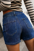 Bluing Asymmetric Wrapped Buttoned High Waist Denim Shorts Shorts c116af8faf886bb1